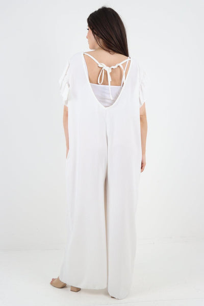 Ruffled Sleeve Back Tie Open Jumpsuit - Lashra Fashion